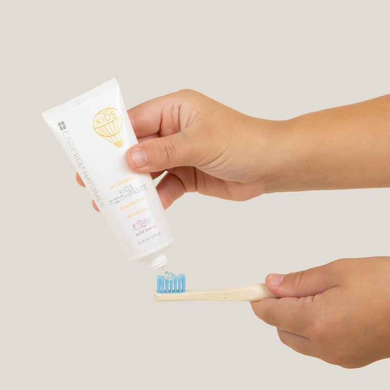 CariFree Naturals Kids Toothpaste | Fluoride-Free, 40% Xylitol, Organic Wild Berry Flavor, pH Elevated, Safe if Swallowed, Sugar-Free, 2.4 oz, Dentist Developed 2.4 Ounce (Pack of 1)