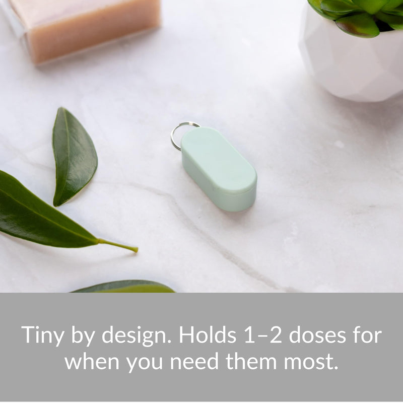Magnetic Pill Holder Keychain for Purse, Travel Case (Mint) | Slim pill container for a purse, pocket or gym bag. Holds daily vitamins and supplements. Magnetic slide, no screw cap. Mint