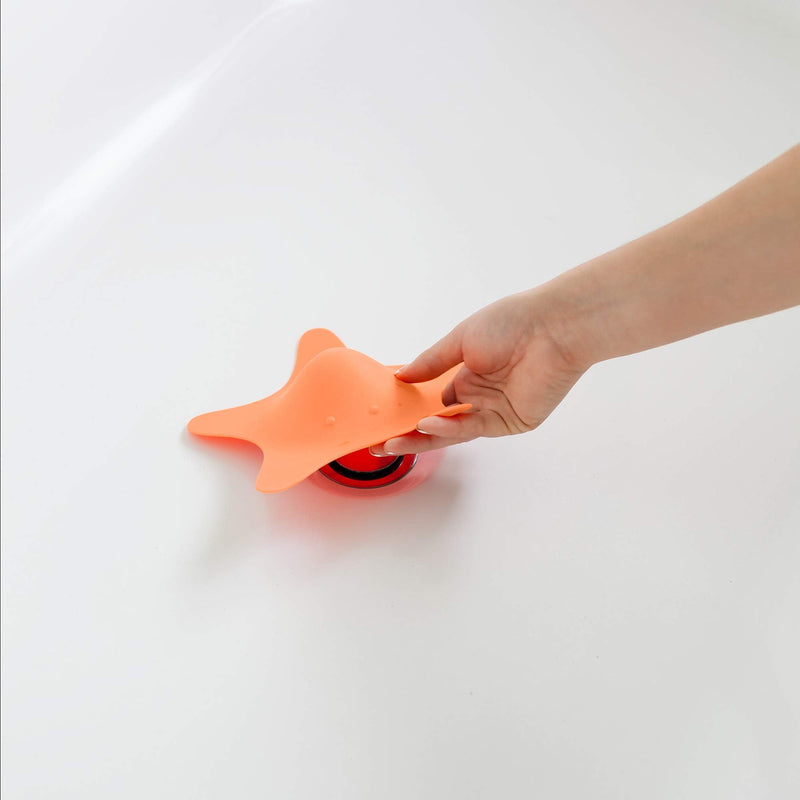 Boon Star Toddler Bathtub and Sink Drain Cover - Starfish Shaped Toddler Bathtub and Sink Drain Cover - Easy to Clean Bath and Sink Stopper - Baby Bath Essentials Orange Drain Cover