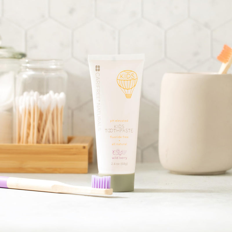 CariFree Naturals Kids Toothpaste | Fluoride-Free, 40% Xylitol, Organic Wild Berry Flavor, pH Elevated, Safe if Swallowed, Sugar-Free, 2.4 oz, Dentist Developed 2.4 Ounce (Pack of 1)