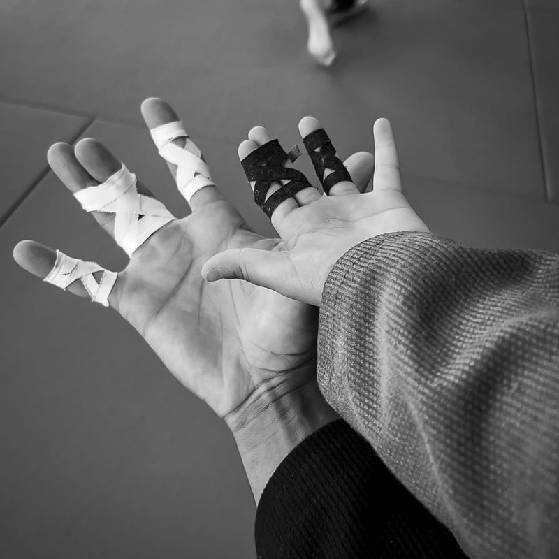 Bighorn Athletics Pro Series Jiu-Jitsu Finger Tape, 8-Rolls with Tin Holder, Enhanced Extra Strength, Residue-Free (0.3-Inch, Black) 0.3-Inch