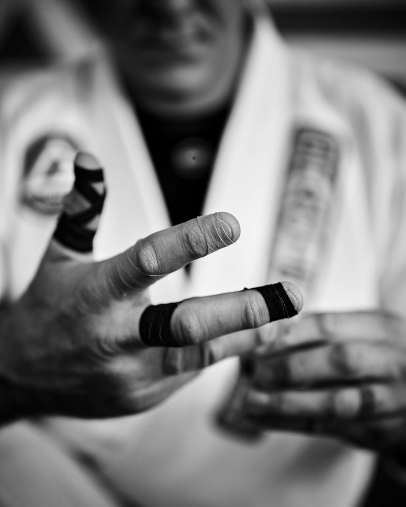 Bighorn Athletics Pro Series Jiu-Jitsu Finger Tape, 8-Rolls with Tin Holder, Enhanced Extra Strength, Residue-Free (0.3-Inch, Black) 0.3-Inch