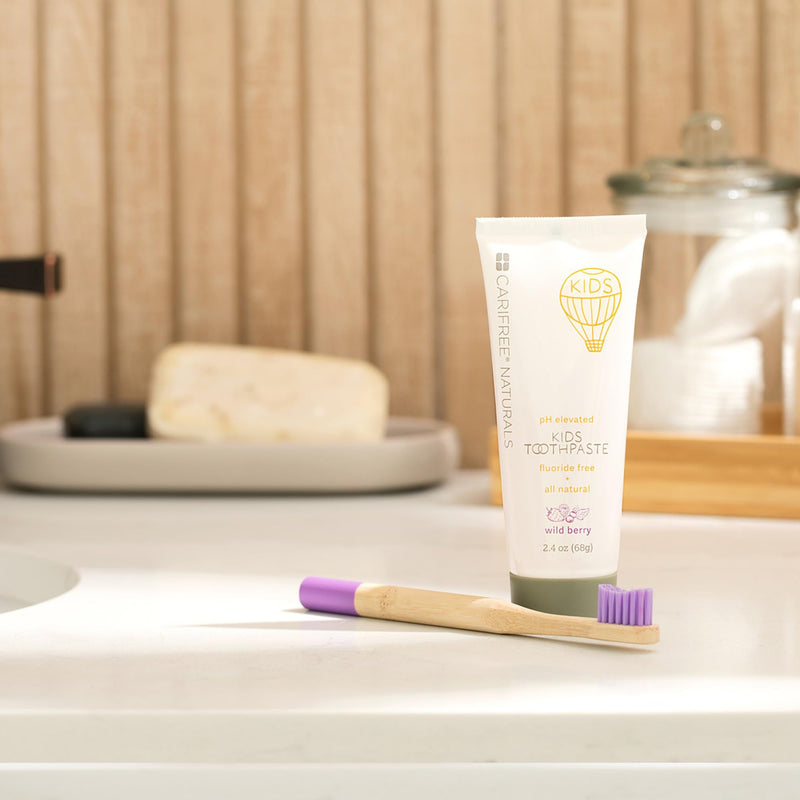 CariFree Naturals Kids Toothpaste | Fluoride-Free, 40% Xylitol, Organic Wild Berry Flavor, pH Elevated, Safe if Swallowed, Sugar-Free, 2.4 oz, Dentist Developed 2.4 Ounce (Pack of 1)