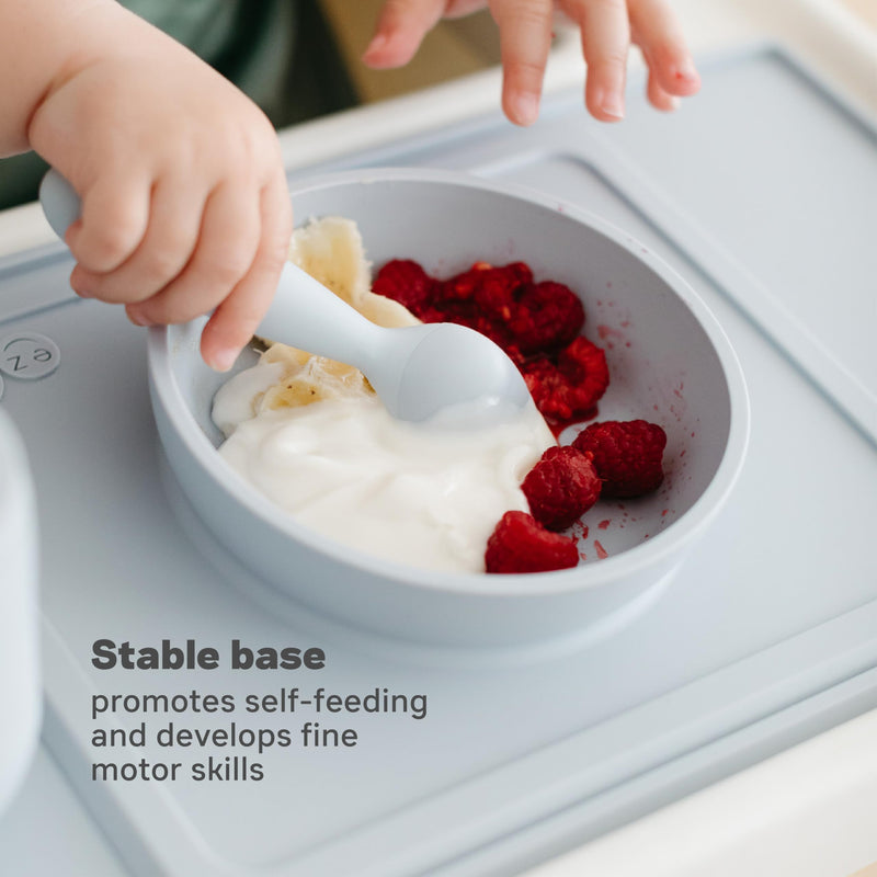 [Australia] - ezpz Mini Bowl for 12 Months+ (Coral) - 100% Silicone Suction Bowl with Built-in Placemat for Toddlers - Comes with a Reusable Travel Bag Coral 