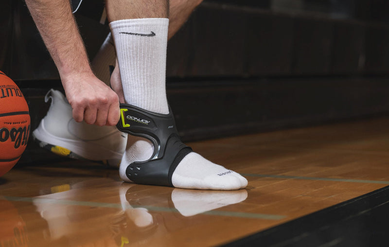 [Australia] - DonJoy Performance POD Ankle Brace, Best Support for Stability, Ankle Sprain, Roll, Strains for Football, Soccer, Basketball, Lacrosse, Volleyball X-Small Left Foot Black 
