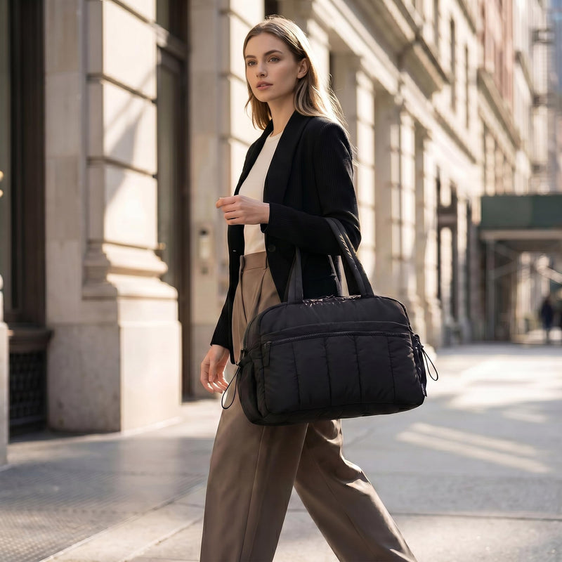 Perphy Women Quilted Travel Duffel Bags with Detachable Shoulder Strap | Multiple organizer pockets. Drawstring side accents. Classic black finish 15.7 * 8.3 * 11.0 inches Black
