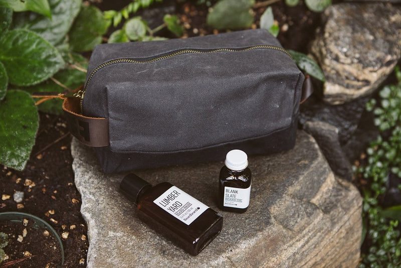 the DOPP KIT | Waxed Cotton Canvas shave and toiletries bag with leather handle Night Sky