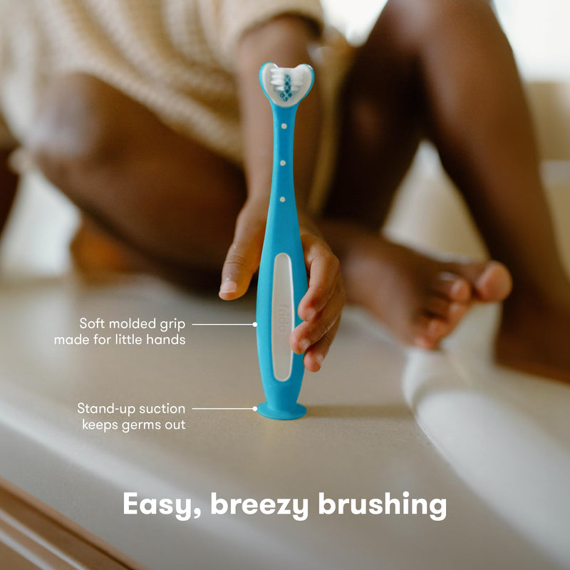 [Australia] - Frida Baby Triple-Angle Toothhugger Training Toddler Toothbrush | Toddler Toothbrush 2 Years and Up, Cleans All Sides at Once | Blue 1 Count (Pack of 1) 