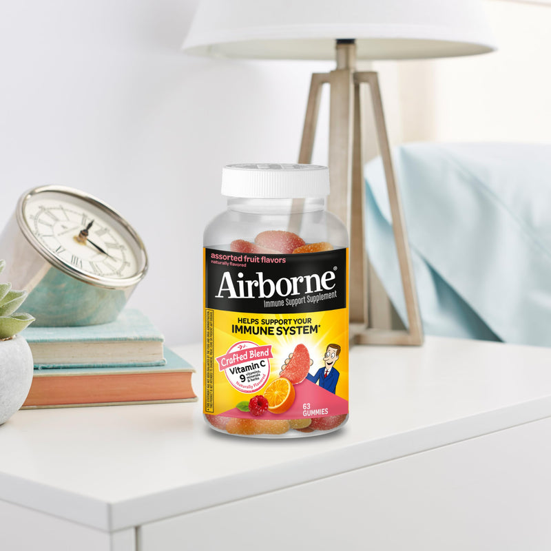 [Australia] - Vitamin C 750mg (per Serving) - Airborne Assorted Fruit Flavored Gummies (63 Count in a Bottle), Gluten-Free Immune Support Supplement with Vitamins A C E, Selenium, Echinacea & Ginger 