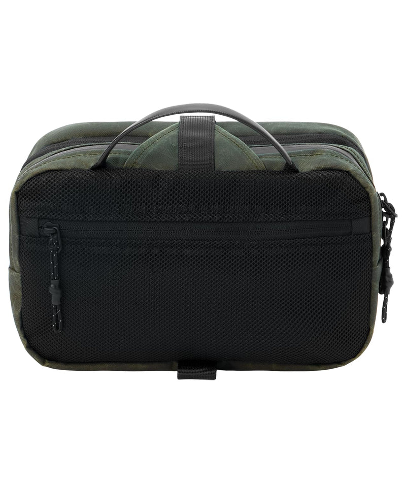 Dakine Split Hanging Travel Kit, Dual-Compartment Dopp Kit | Two zippered compartments separate wet from dry while the wrap-around strap hangs from any towel bar, door or shower rail. OS Rosin/Black
