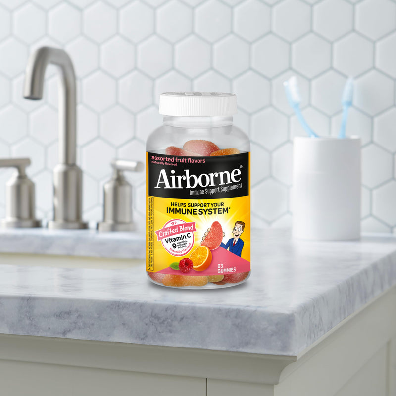 [Australia] - Vitamin C 750mg (per Serving) - Airborne Assorted Fruit Flavored Gummies (63 Count in a Bottle), Gluten-Free Immune Support Supplement with Vitamins A C E, Selenium, Echinacea & Ginger 