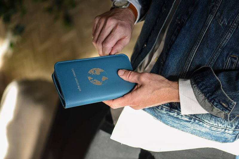 Phone Charging Passport Holder - Travel Wallet with Removable Power Bank holds money, cards, phone, travel docs- RFID Blocking - Compatible with All Phones - Travel Accessories Cerulean