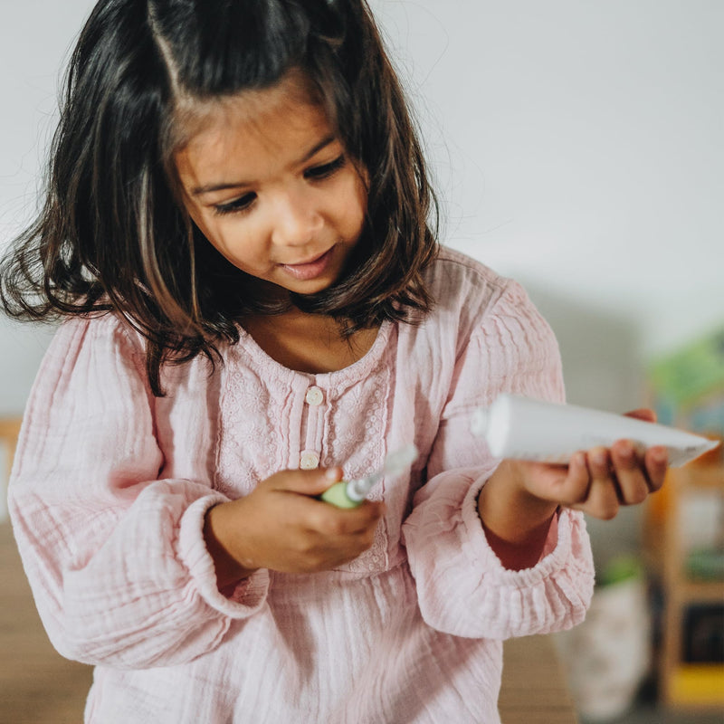 CariFree Naturals Kids Toothpaste | Fluoride-Free, 40% Xylitol, Organic Wild Berry Flavor, pH Elevated, Safe if Swallowed, Sugar-Free, 2.4 oz, Dentist Developed 2.4 Ounce (Pack of 1)