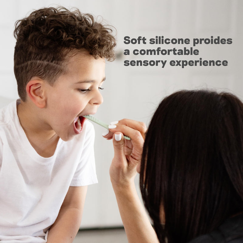 ezpz Baby-Led Toothbrush + Tongue Depressor Dual Pack (Sage) - 100% Silicone Toothbrush + Silicone/Stainless Steel Tongue Depressor - Helps Set-up Infants for a Healthy Oral Care Routine Sage