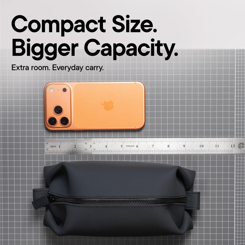 TOOLETRIES The Koby Dopp Kit Toiletry Bag – Lite 9" x 4.5" x 4.5", Charcoal | Compact silicone leak-resistant travel toiletry bag with a heavy-duty zipper that's easy to clean. Lite 9" x 4.5" x 4.5"