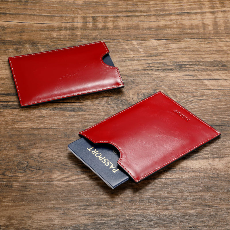 HISCOW Minimalist Leather Passport Sleeve, Slim Holder, Antiqued Red | Full grain cowhide, quick-access U-notch, RFID blocking cover, soft smooth lining, international travel essentials
