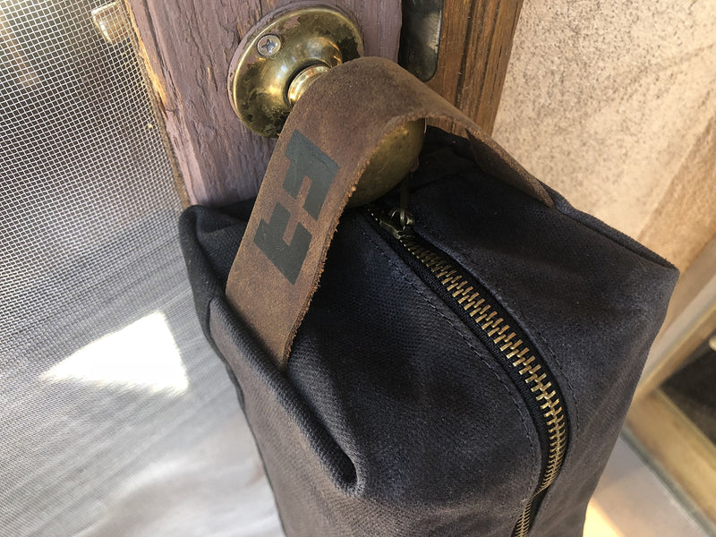 the DOPP KIT | Waxed Cotton Canvas shave and toiletries bag with leather handle Night Sky