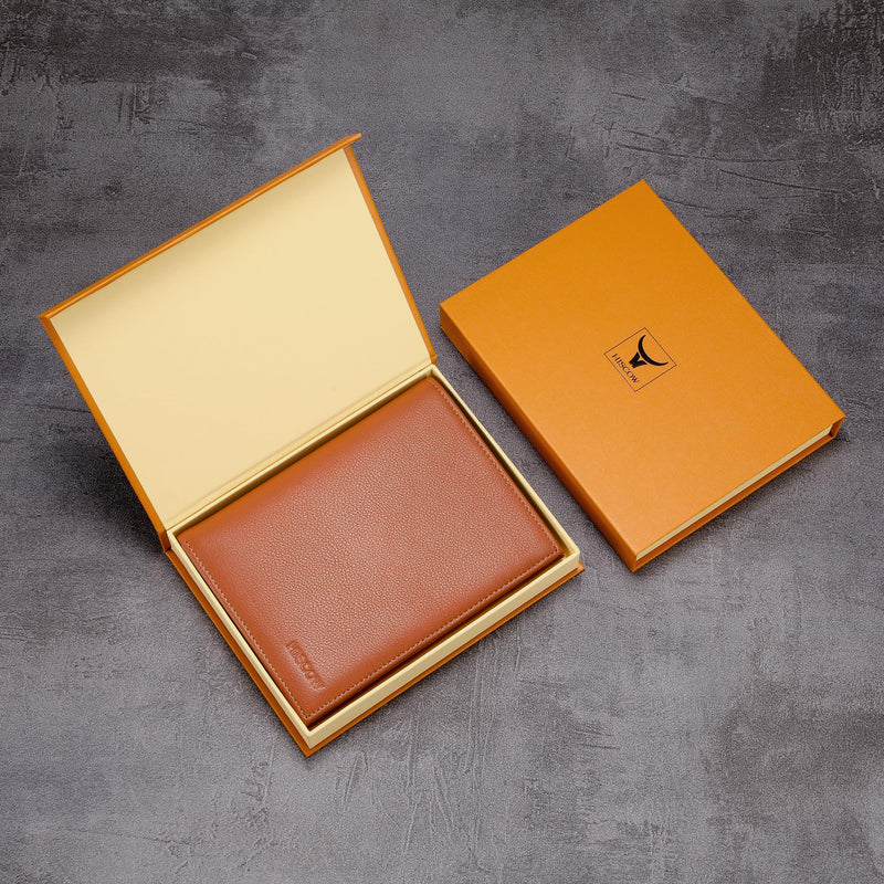 HISCOW Leather Passport Holder for Travel, Bifold Wallet, Tan | Full grain cowhide, RFID blocking, 7 card slots, cash compartment, frosted ID window, travel essentials, premium gift box