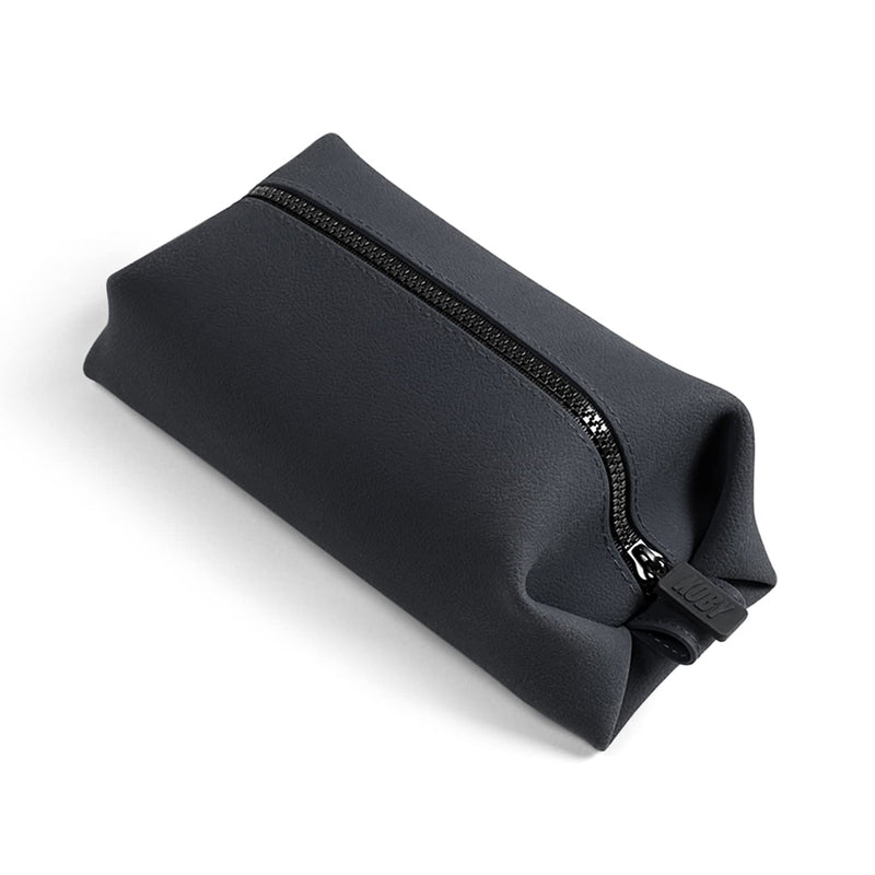 TOOLETRIES The Koby Dopp Kit Toiletry Bag – Lite 9" x 4.5" x 4.5", Charcoal | Compact silicone leak-resistant travel toiletry bag with a heavy-duty zipper that's easy to clean. Lite 9" x 4.5" x 4.5"