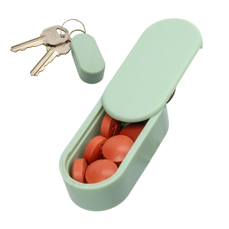 Magnetic Pill Holder Keychain for Purse, Travel Case (Mint) | Slim pill container for a purse, pocket or gym bag. Holds daily vitamins and supplements. Magnetic slide, no screw cap. Mint