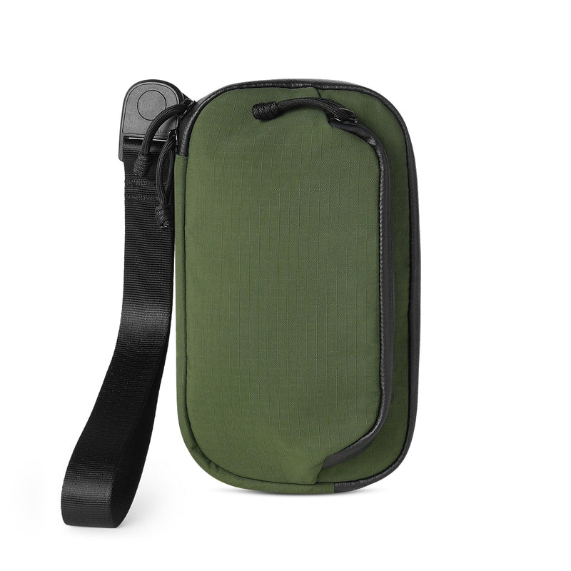 ALPAKA Bravo Passport Pouch RFID Blocking Travel Passport Holder Green | Detachable Hand Strap and Shoulder Strap, Front Zipper Pocket with Hidden AirTag Sleeve, YKK AquaGuard Zippers