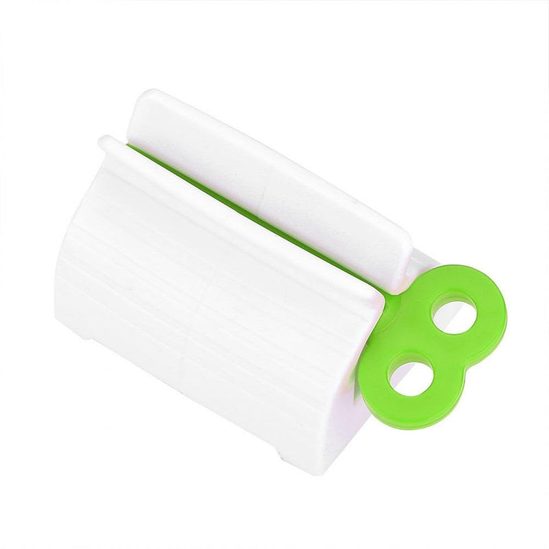 [Australia] - Rolling Tube Toothpaste Squeezer Novel Rotate Handle Dispenser Super Convenient Saver Multipurpose Sucker Easy Plastic Stand Holder for Bathroom(Green) Green 