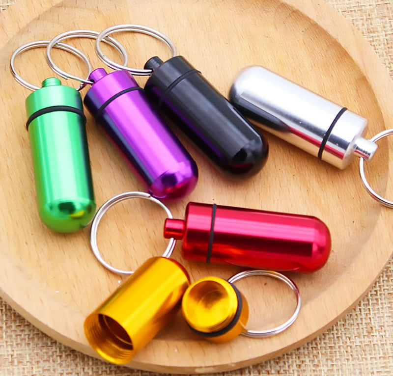 [Australia] - 7 Pcs Portable Mini Pill Boxes Waterproof Aluminum Alloy Pills Bottle 7 Colors in 7 Days Pill Holder Keychain Pill Container 