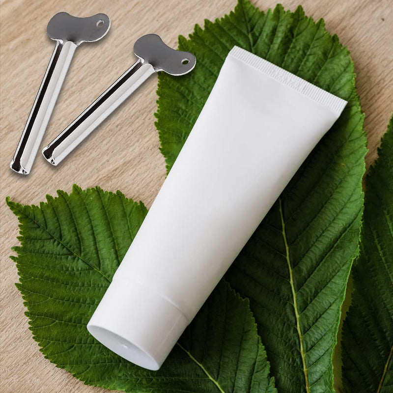 [Australia] - 4 Pcs Metal Tube Toothpaste Squeezer Key Stainless Steel Toothpaste Tube Silver Key Dispenser Tube Squeezer Roller for Toothpaste Cosmetic Oil Cream Paint Squeezer 