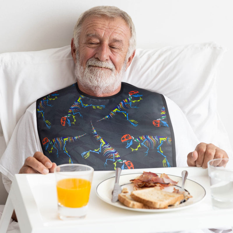 [Australia] - Adult Bibs for Eating: Reusable Adult Size Bib for Men and Women - Washable Clothing Protector with Crumb Catcher Pocket - Dinosaur Bones Edition 