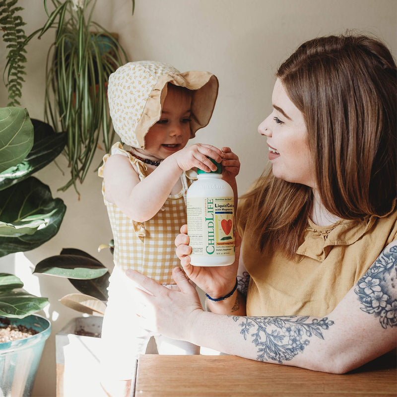 [Australia] - ChildLife Essentials Liquid Calcium Magnesium Supplement - Supports Healthy Bone Growth for Children, Contains Calcium, Magnesium, Zinc, & Vitamin D3, All-Natural, Gluten Free & Non-GMO - Natural Orange Flavor, 16 Ounce Bottle 