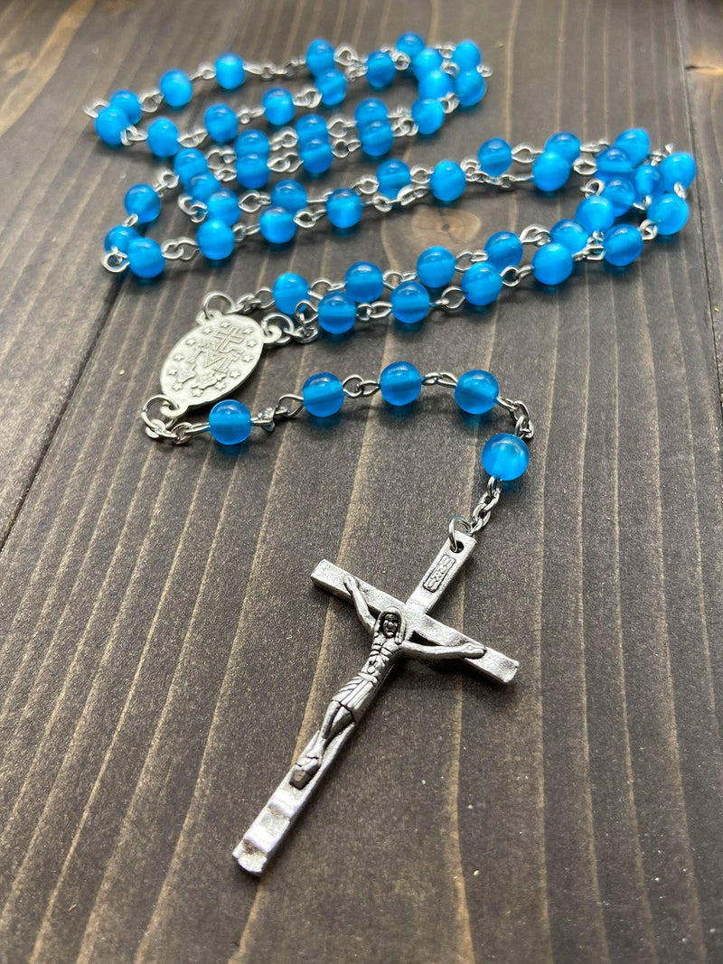 [Australia] - Nazareth Store Rosary Necklace 7mm Round Light Blue Beads Turquoise Cat Eye Stone Miraculous Medal with Crucifix - Velvet Bag 