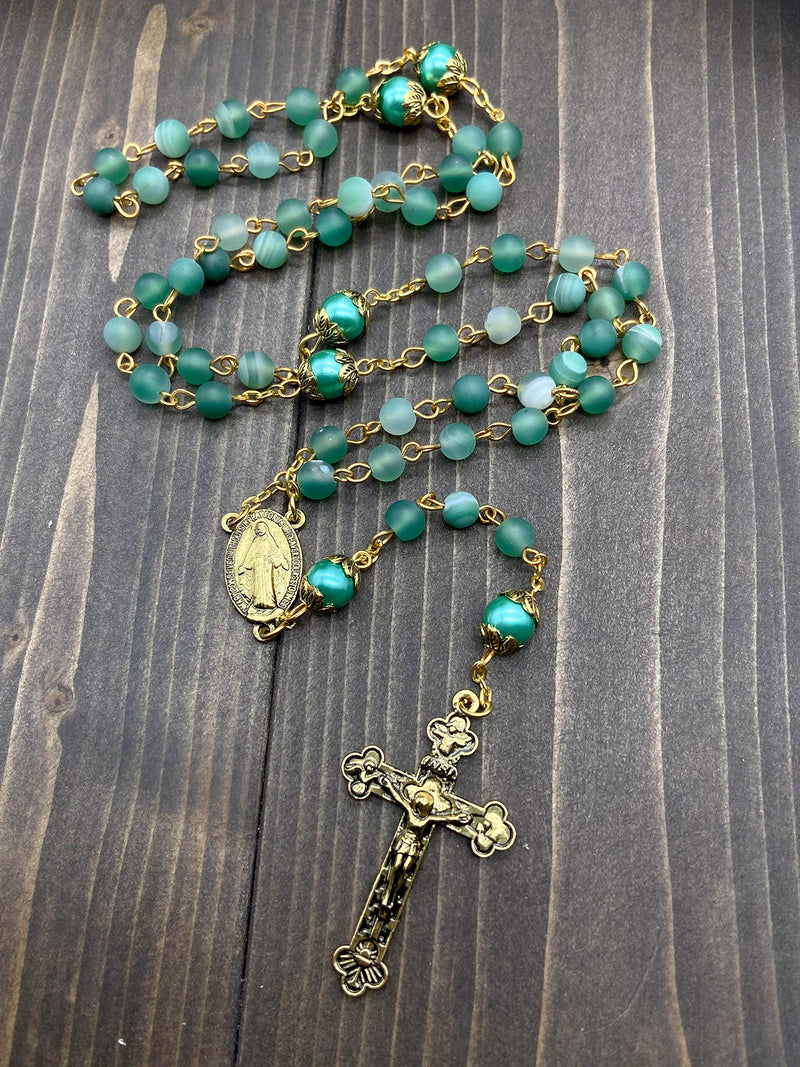 [Australia] - Nazareth Store Catholic Gold Rosary Necklace Matte Stone Beads Green 10mm Pearl Round Beads Miraculous Medal & Cross - Velvet Bag 