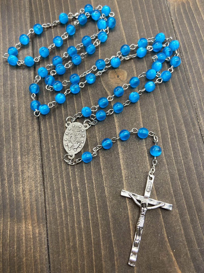 [Australia] - Nazareth Store Rosary Necklace 7mm Round Light Blue Beads Turquoise Cat Eye Stone Miraculous Medal with Crucifix - Velvet Bag 