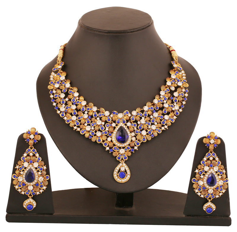 [Australia] - Touchstone Indian Bollywood Traditional Floral Theme White Rhinestone and Blue Faux Sapphire Bridal Designer Jewelry Necklace Set for Women in Antique Gold Tone 