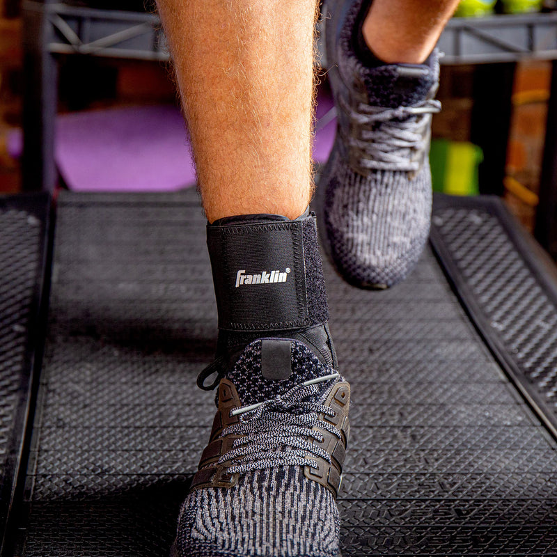 [Australia] - Franklin Sports Ankle Brace - Adjustable Ankle Support Stabilizer - Compression Support for Ankle Sprains and Pain - Athletic Ankle Brace - One Size 